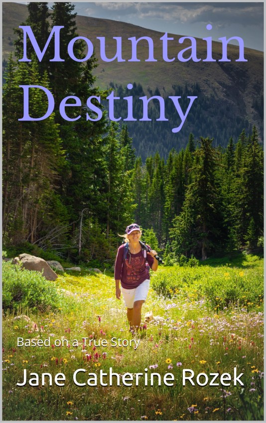 A woman hiking through a vibrant flower-filled meadow in the mountains, with tall trees and hills in the background. The title 'Mountain Destiny' is displayed prominently at the top.